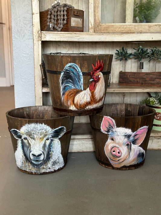 Animals on wooden buckets